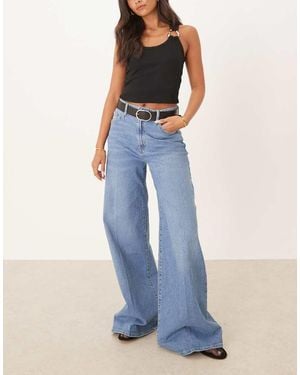 Mango Katoenen Jeans Met Wijde Pijpen En Plooien Aan De Voorkant - Blauw