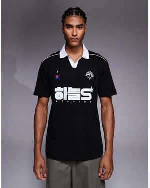 ASOS Relaxed Polo With Piping Detail And Sports Graphic - Blue