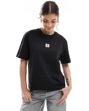 Timberland Camiseta Negra De Manga Corta Con Logo Apilado De - Negro