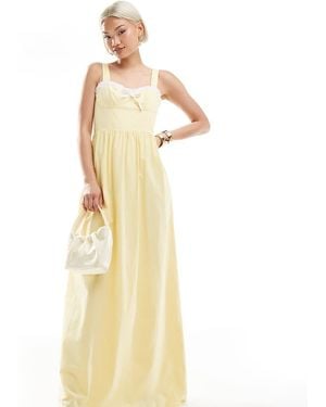 The Frolic Exclusive Sweetheart Contrast Ruffle Trim Bow Detail Maxi Dress - Metallic