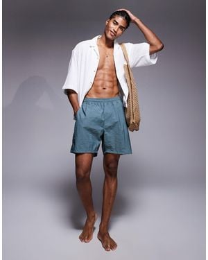 ASOS – mittellange badeshorts - Blau