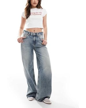 Stradivarius Jeans Met Wijde Pijpen En Gerafelde Taille - Blauw