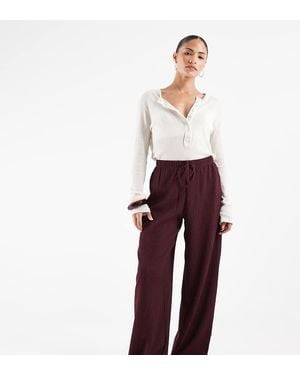 Only Petite Solo Petite Pantaloni A Gamba Larga Testurizzati Color Prugna Scuro - Bianco