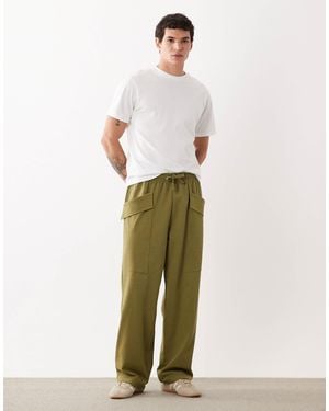 ASOS Circular Design Collection Wide Leg Sweatpants With Cargo Pockets - Green