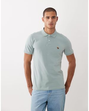 Abercrombie & Fitch Polo manches courtes avec logo emblématique - sauge - Blanc