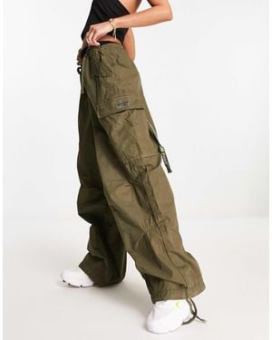 Superdry – weite fallschirmhose - Grün