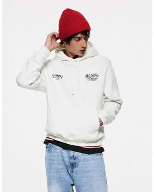 Pull&Bear Sweat à capuche relaxed à motif graphique en cassé - Blanc