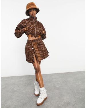 Ivy Park Adidas x - Giacca corta marrone selvaggio con monogramma