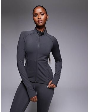 4505 Icon Active Zip Up Sculpting Long Sleeve Jacket With Zip Pockets - Blue