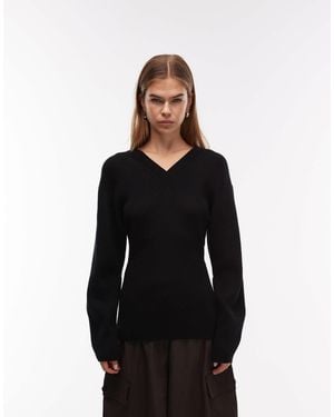 ARKET Pull en laine majoritaire cintré à la taille avec col v - Noir
