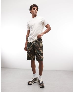 Aape By A Bathing Ape Aape by a bathing ape - short cargo ample à imprimé camouflage - Blanc