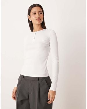 Calvin Klein Slim Fit Monogram Logo Long Sleeve Top - White