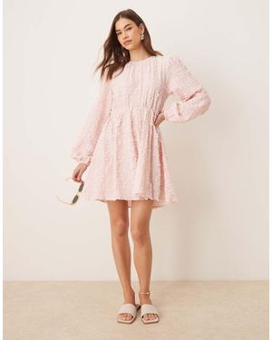 Gina Tricot Textured Mini Dress With Open Tie Back And Volume Sleeves - Pink