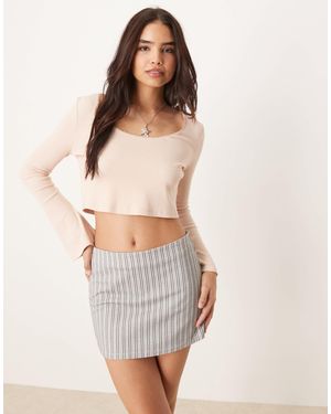 ASOS Crop top côtelé à manches longues et bords à détails - Blanc