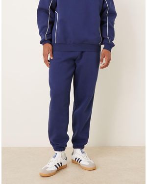 ASOS Joggers Azules Extragrandes Con Ribetes De -Azul Marino
