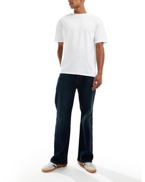 Hollister Jeans Bootcut Color Indaco Scuro - Bianco