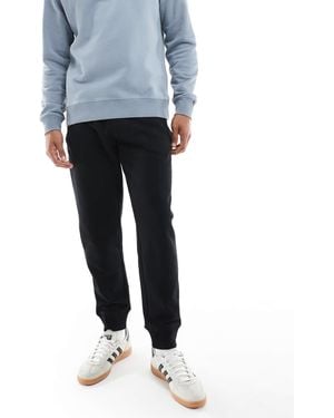 Superdry – essential – jogginghose - Grau