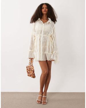 SNDY'S Robe courte froncée à taille cintrée et manches nouées - crème - Neutre