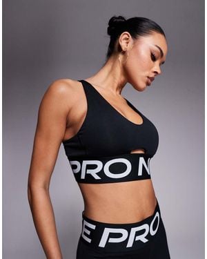 nike training pro indy light support sports bra in black