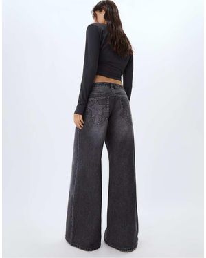 Stradivarius Low-waist Wide-leg Jeans With Stars - Blue