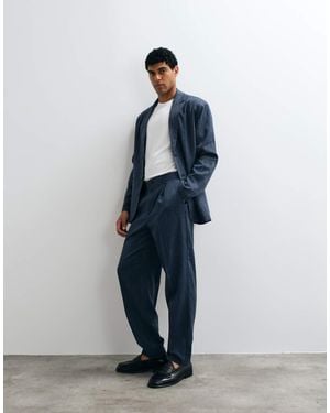 ASOS Oversized Tapered Broek Met Denimlook En Kwartelastische Tailleband - Blauw