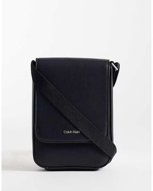 Calvin Klein Jeans Raised Logo Crossbody Bag - Blue