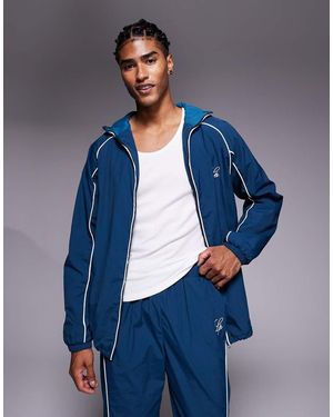 Liquor N Poker Nylon Track Jacket With Logo And Piping Details - Blue