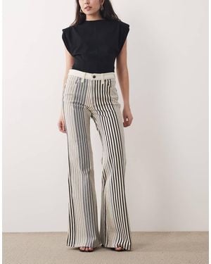 Wrangler Jeans A Zampa Anni '70 E Crema A Righe - Blu