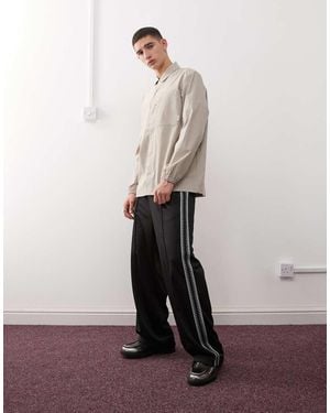 Weekday Joggers Negros De Pernera Ancha Con Detalle De Cinta Lateral De - Blanco