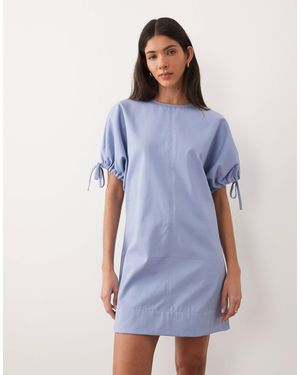 blue rosette dress ASOS Power Shoulder Maxi Dress With Bow Back And Peplum Hem In Navy Bl –  Reliked main image 1
