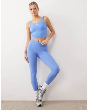 adidas Originals Three Stripes Studios Crossover Waistband leggings - Blue