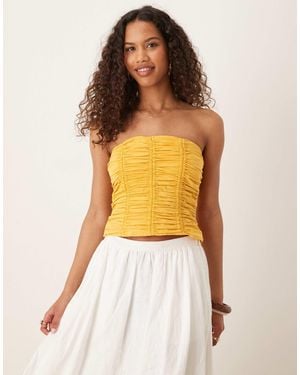 Mango – gerafftes trägerloses top - Gelb