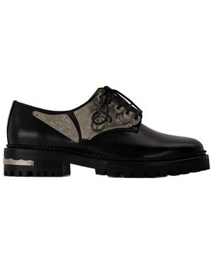 Toga Derbys in schwarzem Leder