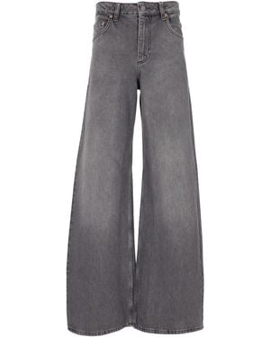 Marine Serre Vaqueros de campana de talle alto en denim con lavado gris láser Moon de