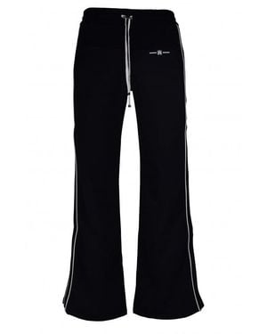 Amiri Relaxed Fit Trousers With Contrast Detailing - Blue