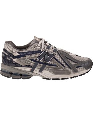 New Balance U1906-sneakers - Grijs