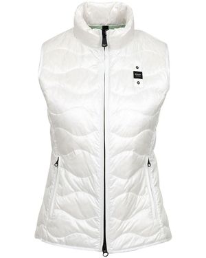 Blauer Suéteres blancos