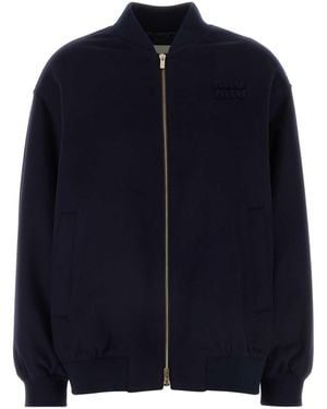 Miu Miu Chaqueta de bombardero de terciopelo azul oscuro