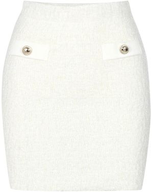 SIMONA CORSELLINI Skirts - White