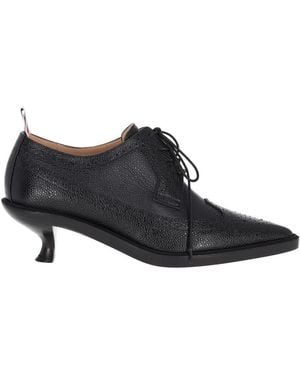 Thom Browne Longwing Brogue mit 50 mm gebogenem Absatz und Ledersohle aus genarbtem Leder - Schwarz