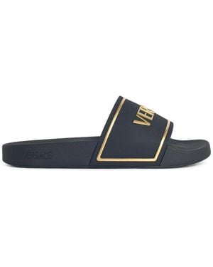 Versace Schwarze Gummipantoffeln von - Weiß