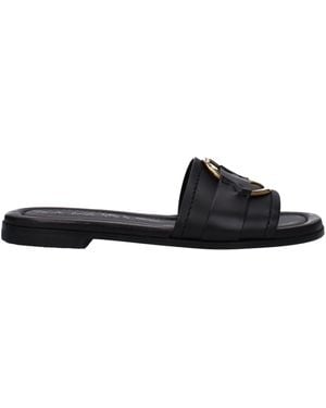 Moncler Slippers And Hooves Bell Leather - Black