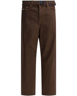 Sacai Jeans mit entspannter Passform - Braun