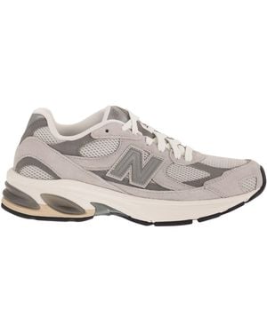 New Balance U2010-sneakers Met Logo Aan De Zijkant - Wit