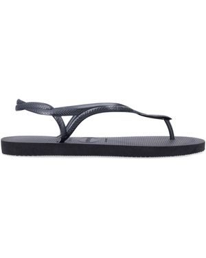 Havaianas Flache Schuhe schwarz - Blau
