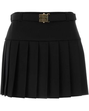 Miu Miu Mini falda de lana de estiramiento negro de