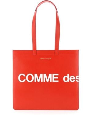 Comme des Garçons Comme des Garcons Portemonnaie aus Leder mit Logo - Rot