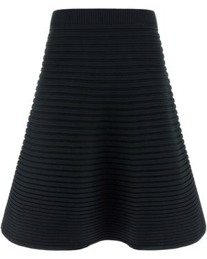 Pleats Please Issey Miyake Midirock "Bounce Knit". - Blau
