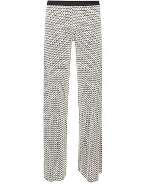 パンツ Siyu Trousers Siyu Printed Trousers from $242.00 - on Stylight