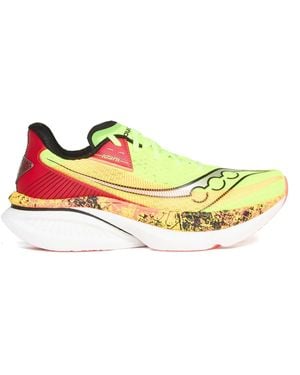 Saucony Este es el nombre del fabricante. - Amarillo